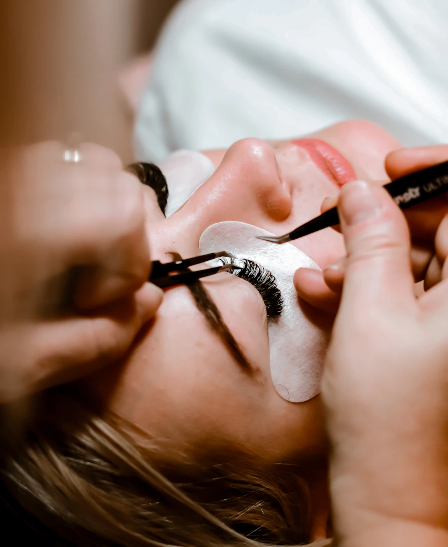 Eyelash extensions being applied